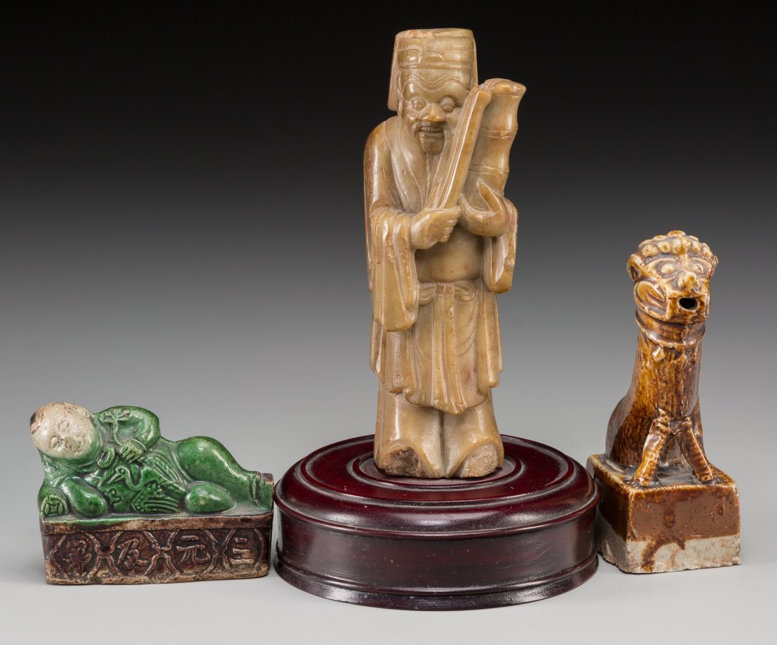 A Chinese Carved Soapstone Elder and Two Tang Dy: A Chinese Carved Soapstone Elder and Two Tang Dynasty Ceramic Figures 5-7/8 inches high (14