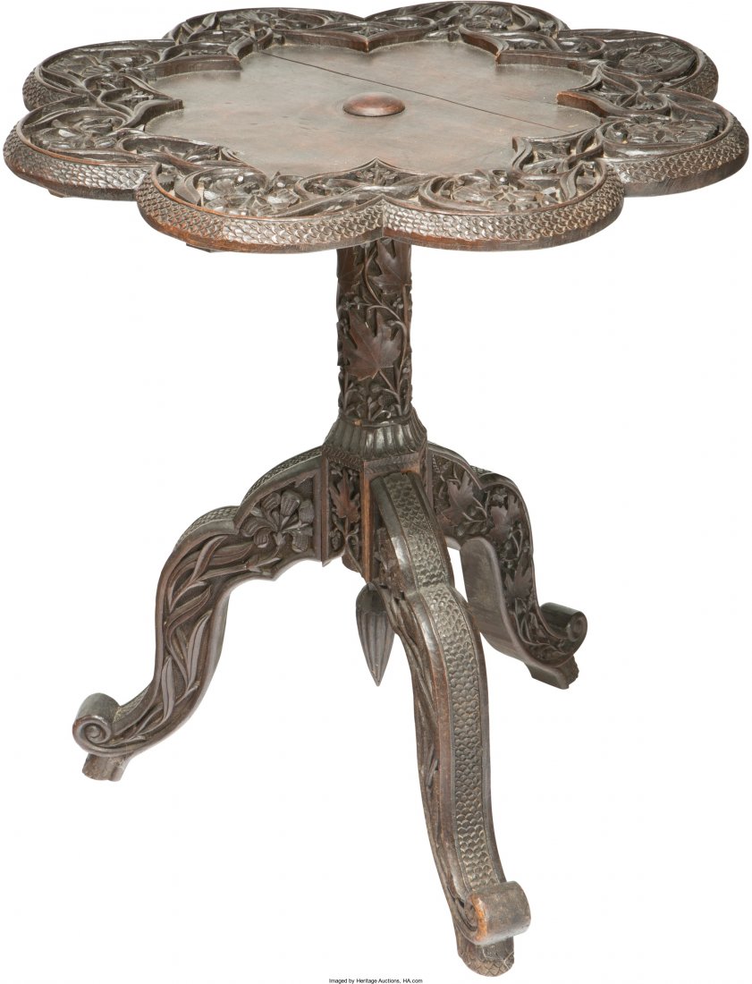 An Anglo-Indian Japanesque Carved Rosewood Tea T: An Anglo-Indian Japanesque Carved Rosewood Tea Table, 19th century26-3/8 inches high x 24