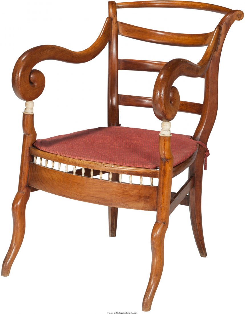 A Colonial Anglo-Indian Walnut, Ivory and Cane A: A Colonial Anglo-Indian Padouk, Bone and Cane Armchair, 19th century 34-1/2 h x 22-1/4 w x 22 d inc