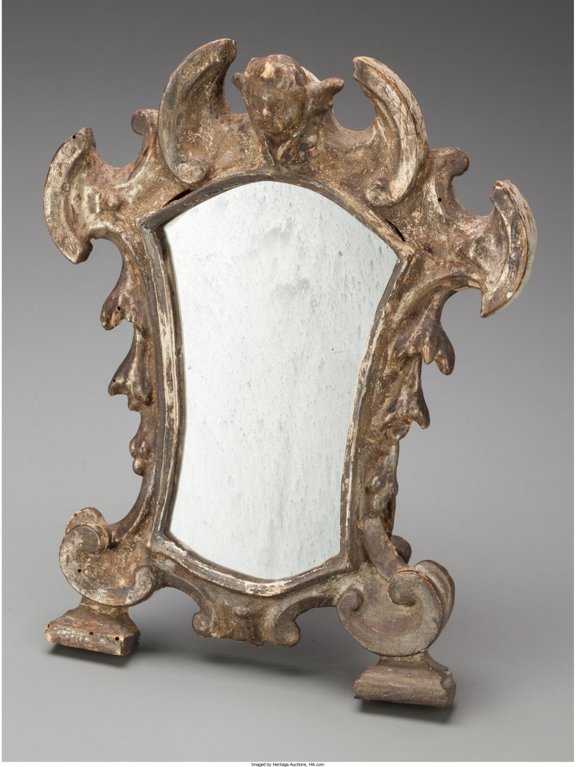 An Italian Baroque Silvered Wood Table Mirror, l: An Italian Baroque Silvered Wood Table Mirror, late 17th century in part 11-1/2 inches