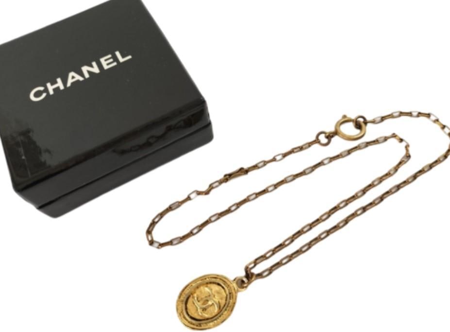 Chanel Gold Tone Interlocking C Necklace: Important information regarding luxury brand items: Please carefully review the photographs provided as these items are pre-owned and may exhibit varying degrees of wear. Due to the nature of these it