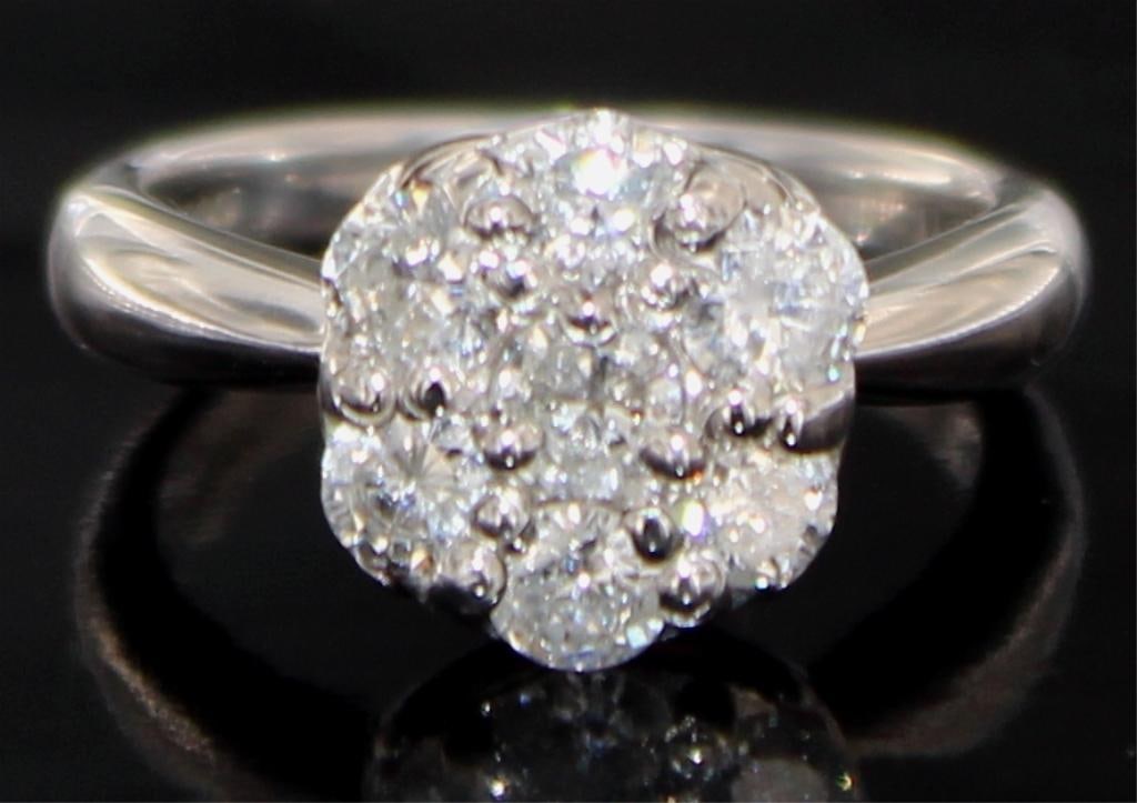 Platinum 1.00 ct Natural Diamond Cocktail Ring: PGL Digital Appraisal Retail Replacement Value $5,090 Natural Diamonds Carat Weight: 1.00 Color Grade: IClarity Grade: SI1-SI2 Size 5 5.75 grams 404195-501 NOTE: PGL Appraisal is a digital copy. Ifyou