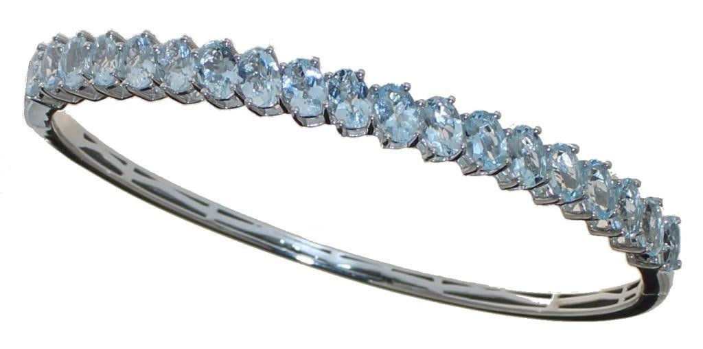 Natural 9.66 ct Aquamarine Bangle Bracelet: PGL Digital Appraisal. Sterling Silver Retail Replacement Value $979.00 Natural Aquamarine Cutting Style: Oval BrilliantCarat Weight: 9.66 369075 NOTE: PGL Appraisal is a digital copy. If you would li