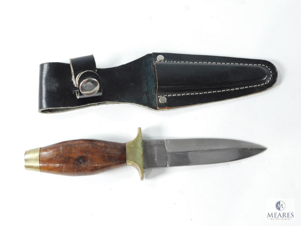 Boot Knife with Black Leather Sheath: Knife ia marked Rostfrei. Boot knife with leather sheath and wood handle, brass guard and pommel. Overall length is 7-1/2", with a 4" blade.