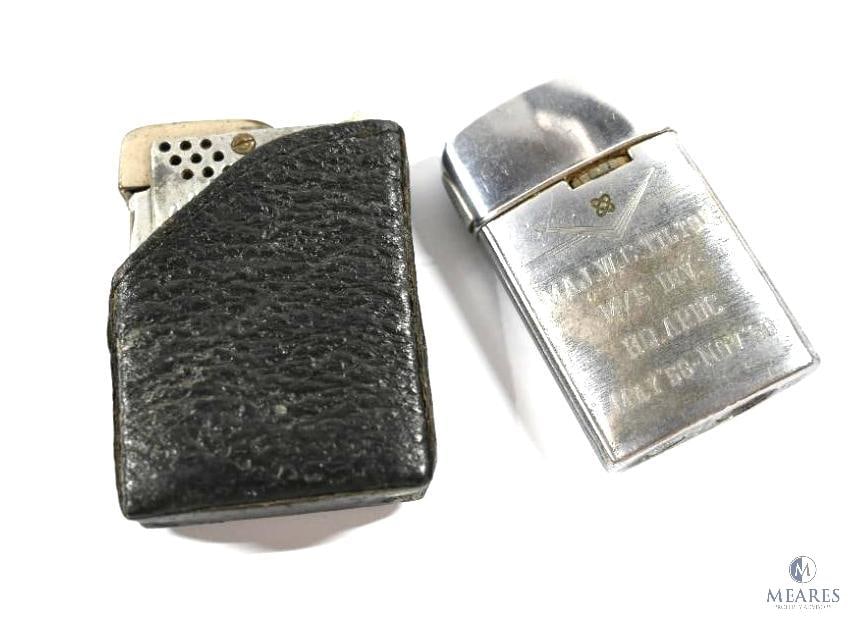 Two Vintage Lighters: One lighter is a "Super Matchbox" lighter w/case. The other lighter is a Ronson Varaflame Windlite with the engraving "Maj. W. C. Tilton M/E Div. HQARDC May 58 - Nov 60" on the side.