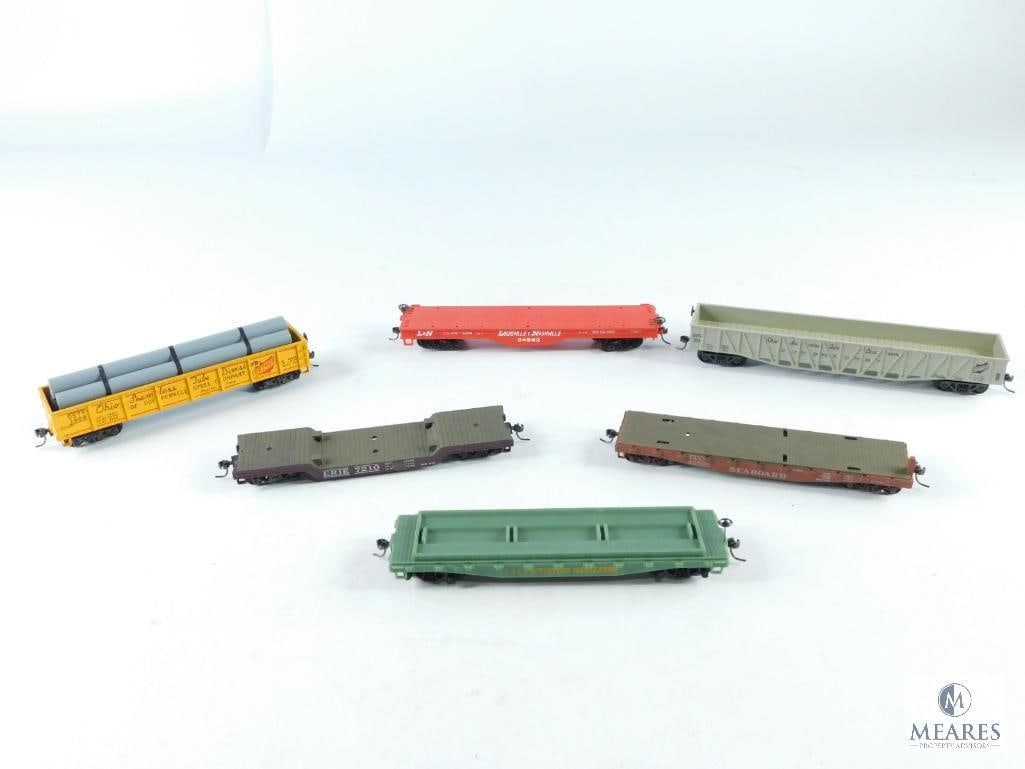 Seven Miniature Train Cars (1 of 7)