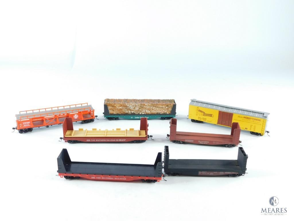 Seven Miniature Train Cars (1 of 8)