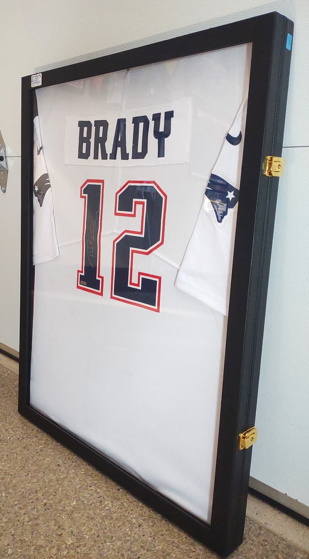 TOM BRADY SIGNED AUTHENTICATED NEW ENGLAND JERSEY: FORENSICALLY SIGNED TOM BRADY NEW ENGLAND JERSEY FROM THE FUTURE HALL OF FAME QUARTERBACK Tom Brady's time with the New England Patriots is a defining chapter in sports history. From his unexpected ri