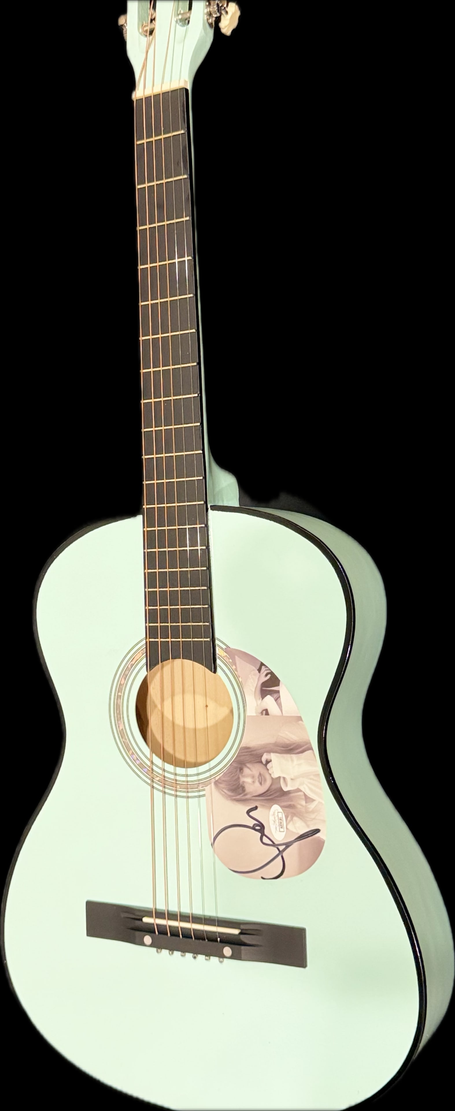 TAYLOR SWIFT GUITAR WITH SIGNED CUSTOM INSERT PICKGUARD AUTHENTICATED (JSA): BEAUTIFUL DISPLAY OF SUPERSTAR TAYLOR SWIFT GUITAR WITH SIGNED CUSTOM PICKGARD -CRISP SIGNATURE, AUTHENTICATED (JSA) 38 X 22 X 7 Taylor Swift is known for using a variety of acoustic guitars throughou
