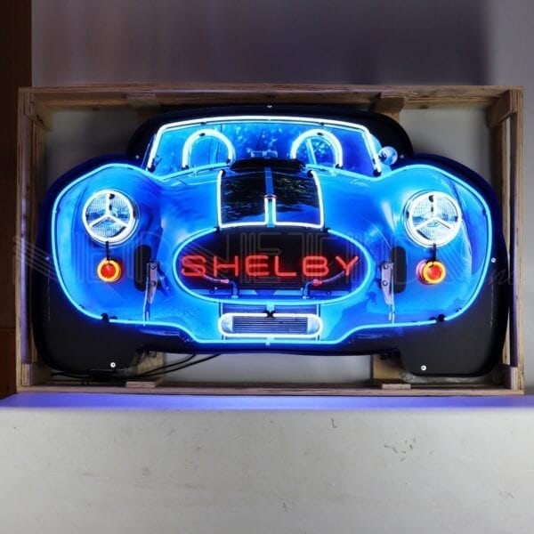 SHELBY GRILL NEON 60 x 28 x 6: NEW SHELBY LOGO GRILL 5' COMMERCIAL GRADE Housed in metal can features multi-colored, hand blown neon tubing. The glass tubes are surrounded by a sturdy, commercial grade black steel housing. Your neo
