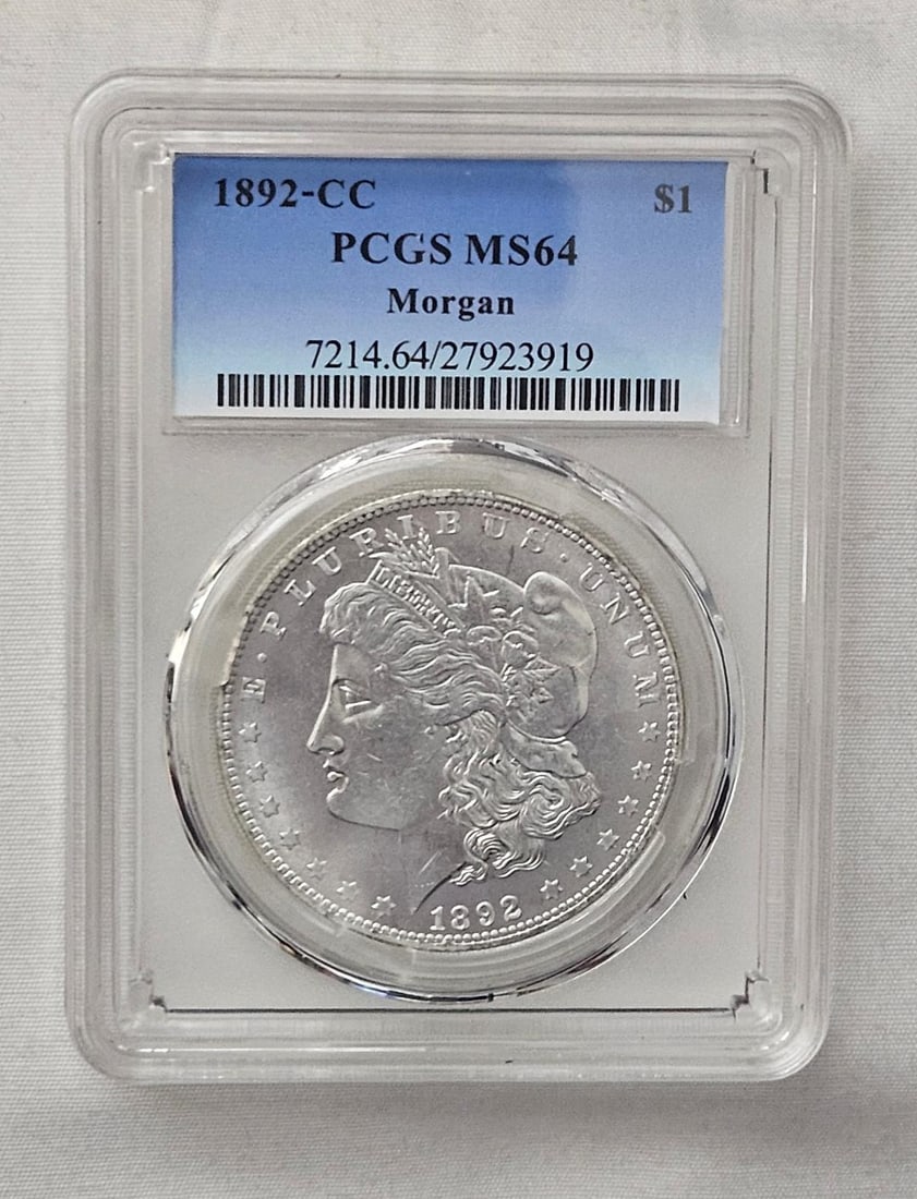 1892cc CARSON CITY SILVER DOLLAR RARE DATE, GEM COIN: I have to start by stating that as nice as this coin is, it is not being sold as a genuine coin. This is one of the most impressive counterfeits I have ever seen! I have been collecting these for as l