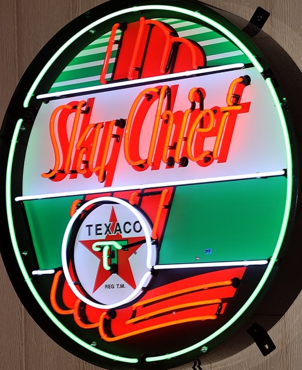 TEXACO SKYCHIEF NEON 36": 36 INCH DIAMETERThis neon sign is housed in a metal cans and features multi-colored, hand blown neon tubing. Each sign is 3 feet across, and the glass tubes are surrounded by a sturdy, commercial grad