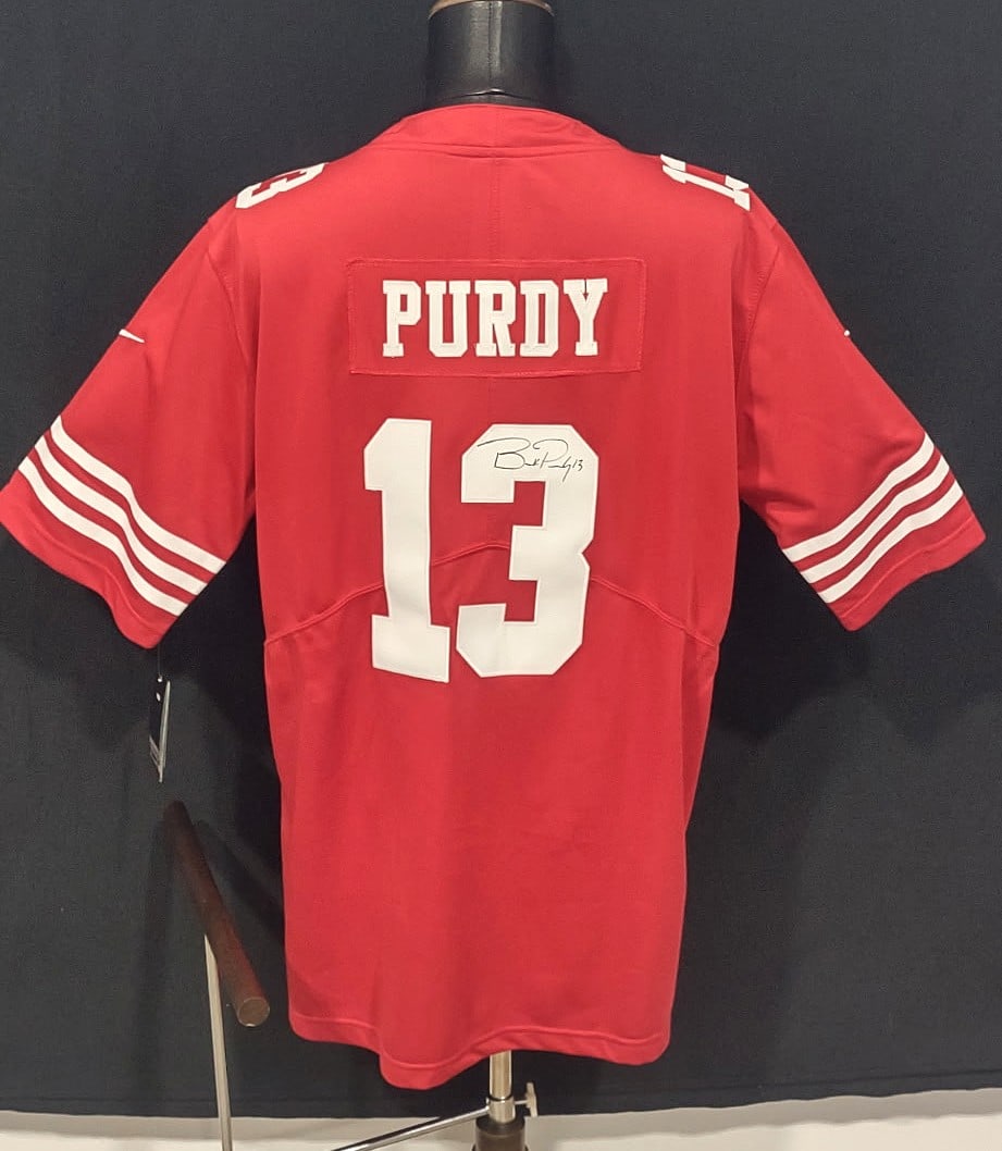 BROCK PURDY SIGNED AUTHENTICATED JERSEY: Brock Purdy is an American professional football quarterback for the San Francisco 49ers of the National Football League (NFL).He played college football for the Iowa State Cyclones and was selected