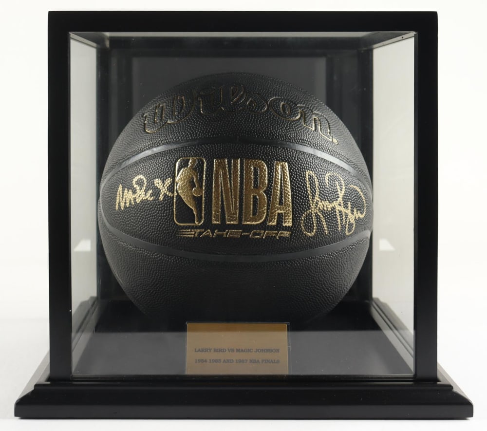 MAGIC JOHNSON AND LARRY BIRD DUAL SIGNED NBA BASKETBALL AUTHENTICATED (PSA & BECKETT): The Magic Johnson and Larry Bird rivalry is legendary, beginning in college and continuing through their iconic NBA careers. Their competitive spirit and friendship are credited with revitalizing the