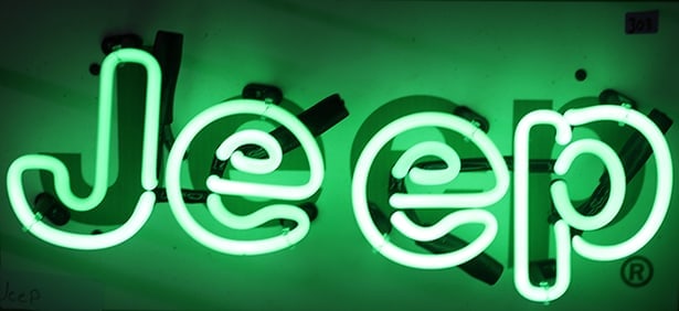 JEEP JUNIOR NEON- NO RESERVE!: NEW BRIGHT NEON GREEN TUBING 17 X 8 X 6 The word “Jeep” is written in the brand’s recognizable rounded lowercase font. The letters are made from bright green neon tubing, glowing against