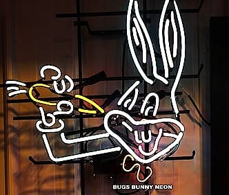 BUGS BUNNY NEON: NEVER SEEN ANOTHER ONE EVER OFFERED, BEEN IN MY COLLECTION FOR MANY YEARS. Bugs Bunny’s long ears are upright. and his classic mischievous grin with buck teeth visible.Bright White NEON tubing NEON