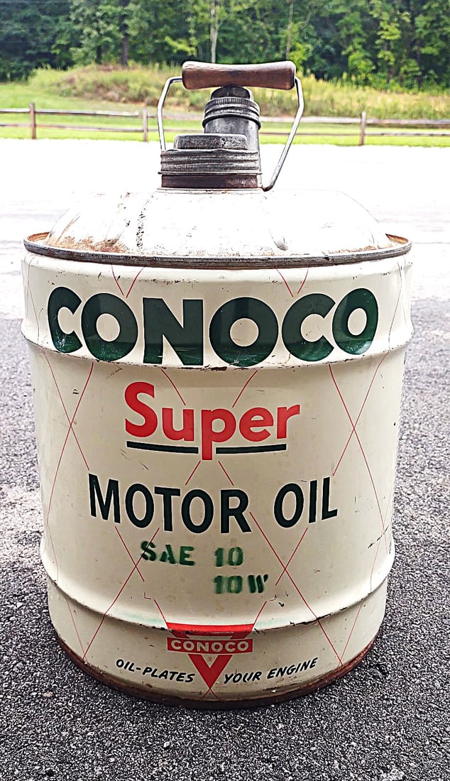 CONOCO OIL CAN -ORIGINAL CONDITION: ORIGINAL CONOCO OIL CAN 17X 12 X 12 Brand: CONOCO (large red lettering at the top)Product: Motor OilType/Weight: SAE 40 Classic red CONOCO triangle logoBlack and gold accent band near the
