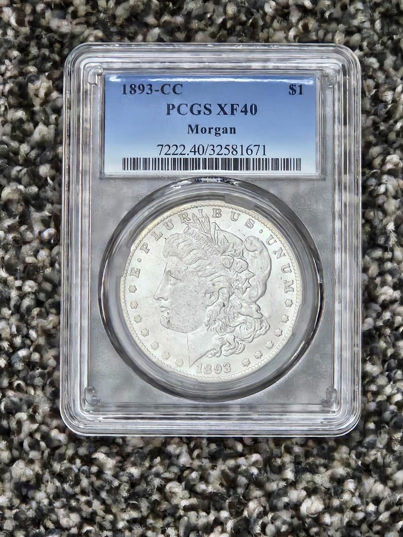 1893CC CARSON CITY SILVER DOLLAR: THIS IS NOT A GENUINE COIN; THE SECOND RAREST DATE IN THE SERIES, IMPOSSIBLE TO FIND THIS NICE! This is an amazing, genuine looking replica of the famed Carson City Silver Dollars. They look genuine, 