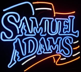 SAMUEL ADAMS NEON-ORIGINAL: HARD TO FIND ORIGINAL -BRIGHT NEON TUBING 20 X 27 Samuel Adams logo — a well-known American beer brand founded in Boston, Massachusetts.Blue script lettering with a glowing/neon styleOrange
