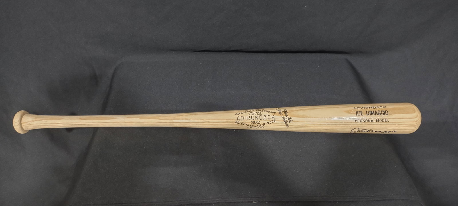 JOE DIMAGGIO SIGNED MCLAUGHLIN-MILLARD INC ADIRONDACK BASEBALL BAT: Joe DiMaggio is one of the most iconic figures in baseball history—especially relevant if you're dealing with collectibles.Nickname: “The Yankee Clipper”Team: New York Yankees
