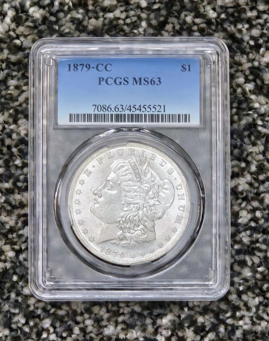 RARE 1879 CC MORGAN SILVER DOLLAR, NOT GENUINE: This coin is not genuine! I need you to understand this because there will be no returns. I have had a couple winning bidders want to return the item because they said they say they never read the des