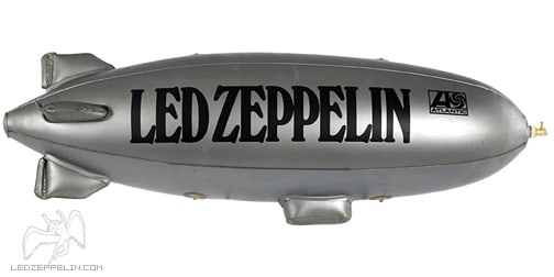 LED ZEPPLIN PROMOTIONAL BLOW-UP BLIMP, ORIGINAL PACKAGE 23X30": LED ZEPPLIN, the name speaks for itself. Well, how about a promotional plastic blow-up blimp in the original wrapping. Condition looks to be mint, everything is intact. The 2003 Led Zeppelin