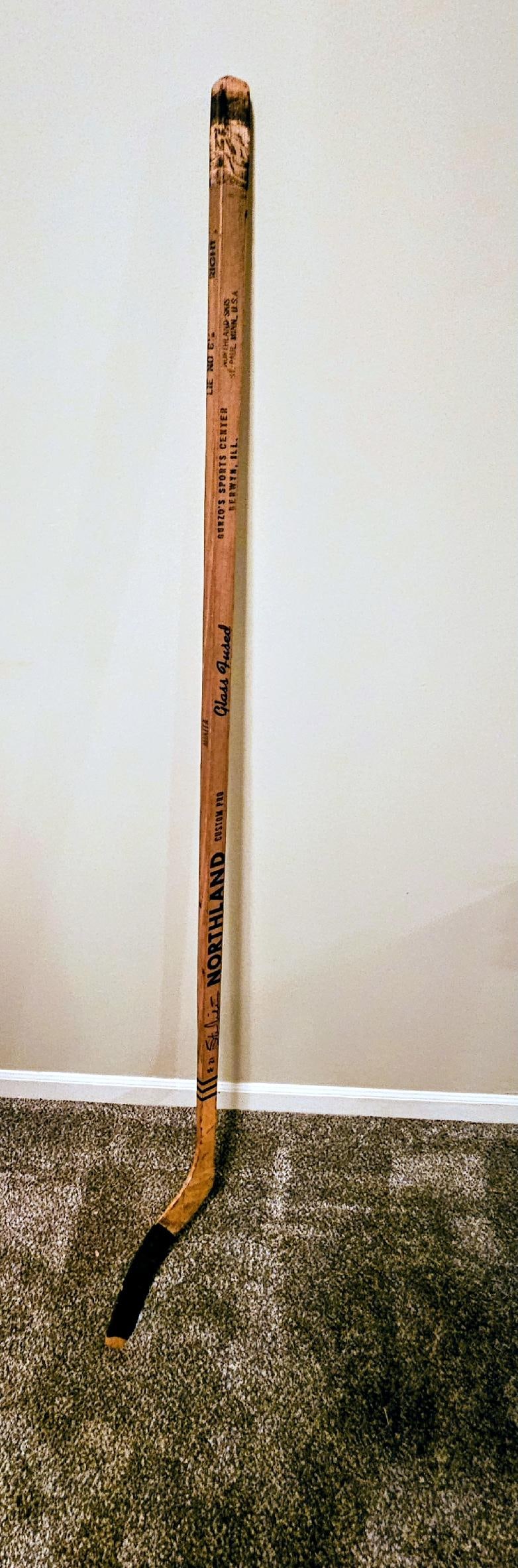 SIGNED 1960'S STAN MIKITA BANANA HOOK GAME USED HOCKEY STICK: 1960'S STAN MIKITA GAME USED HOCKEY STICK WITH HIS FAMOUS HAND MADE BANANA HOOK! Interesting fact about Stan Mikita, and no it is not that he was revered in the movie Waynes World...this fact is even 