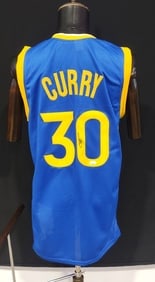 SETH CURRY JSA AUTHENTICATED SIGNED GOLDEN STATE JERSEY: SETH CURRY — SIGNED & JSA AUTHENTICATED Seth Curry (born August 23, 1990) is an American professional basketball player and one of the NBA’s premier long-range shooters. The younger brother of