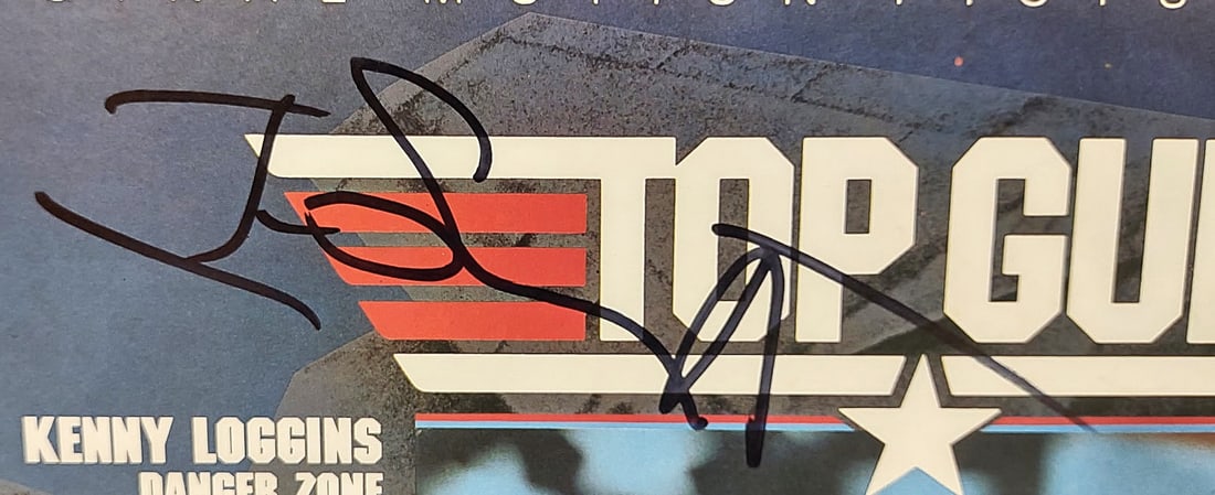 TOP GUN SOUNDTRACK CAST SIGNED ALBUM-REAL AUTHENTIC: CAST SIGNED BT TOM CRUISE, KELLY MCGILLIS, JAMES TOLKAN, MEG RYAN, VAL KILMER, AND TOM SKERITT The Top Gun Soundtrack is one of the most iconic movie soundtracks of the 1980s, tied to the blockbuster
