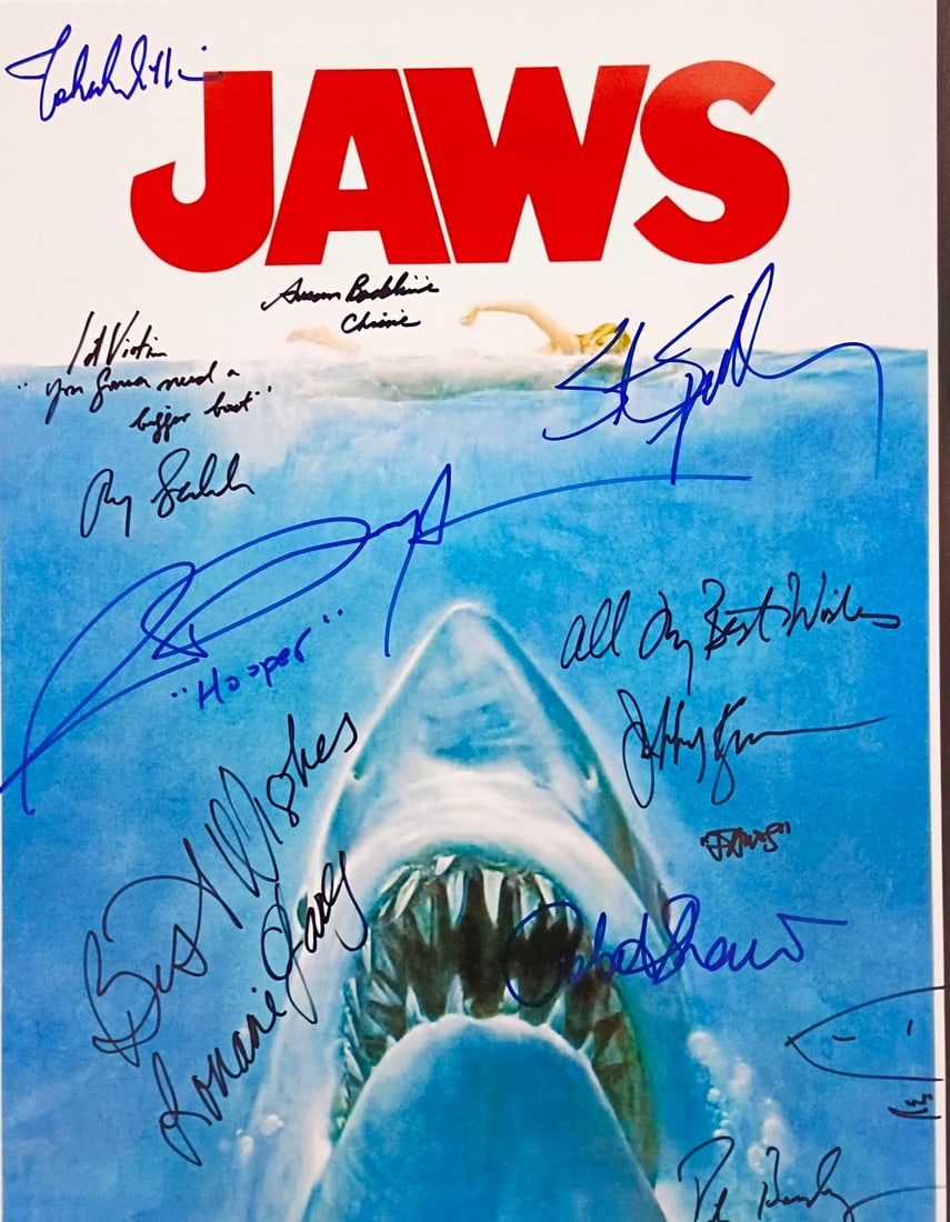 JAWS CAST SIGNED POSTER-AUTHENTICATED BY REAL AUTHENTIC: JAWS — MULTI-SIGNED CAST & CREW MOVIE POSTER — STEVEN SPIELBERG CLASSIC AUTHENTICATED BY REAL AUTHENTIC Impressive Jaws movie poster featuring numerous signatures and inscriptions associated with