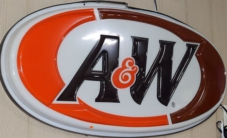 A&W ROOT BEER ORIGINAL ILLUMINATED ADVERTISING SIGN- VERY RARE: VINTAGE A&W ROOT BEER LIGHTED ADVERTISING SIGN — LARGE OVAL DISPLAY Eye-catching A&W Root Beer illuminated advertising sign featuring the company's classic oval logo in orange, brown, black and whit