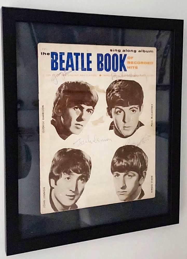 BEATLES SIGNED SONG BOOK SIGNED BY ALL 4-AUTHENTICATED-RARE: THE BEATLES — “THE BEATLE BOOK OF RECORDED HITS” — FOUR SIGNATURES — FRAMED Rare and visually impressive vintage “The Beatle Book of Recorded Hits” sing-along songbook, featuring