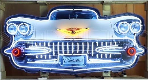 CADILLAC GRILL NEON 60 x 28 x 6: The sign is a detailed recreation of the rear of a 1959 Cadillac, a vehicle famous for its dramatic and iconic tailfins. The image captures the wide body, the dual bullet-style taillights on each fin,