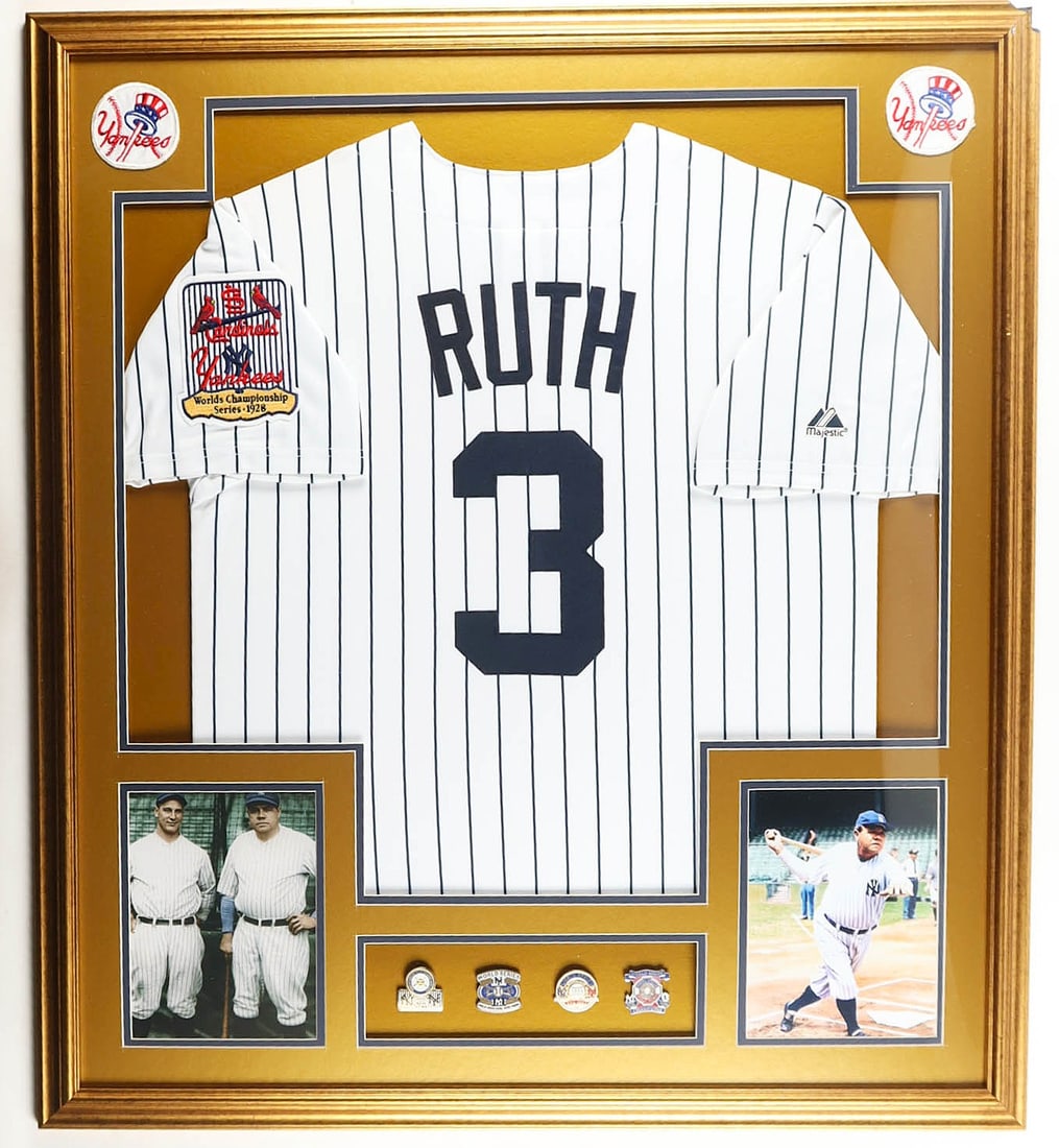 BABE RUTH CUSTOM FRAMED JERSEY DISPLAY WITH 4 WORLD SERIES PINS-UNSIGNED: BABE RUTH CUSTOM FRAMED JERSEY DISPLAY-UNSIGNED Including a framed set of New York Yankees commemorative pins, likely representing early team history (including 1922 World Series and 1923 Yankees