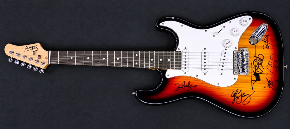 THE EAGLES BAND SIGNED ELECTRIC GUITAR: THE EAGLES BAND SIGNED ELECTRIC GUITAR AI ANAYSIS: Don Henley — left: The autograph clearly reads “Don Henley.” The construction is consistent with his commonly seen signature style: