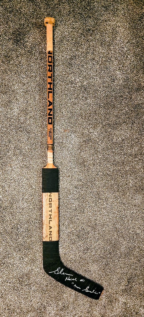 GLENN HALL 1960'S GAME STICK SIGNED: Vintage 1960'S Glenn Hall game goalie stick, shows great usage and is signed by him with the inscription of his given nickname "Mr Goaiie" No hockey player was as respected and revered like this recen