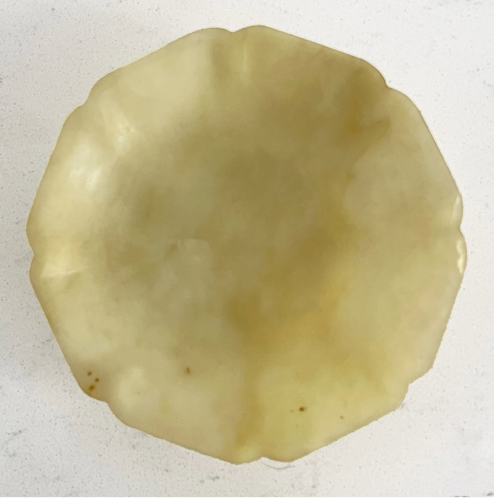 Antique Nephrite Mutton Fat Footed Bowl, QING DYNASTY (1644-1911): Small 5" across x 1.5" high. From Califonia collector. Provenance: Alfred and Maria Tarski, Berkeley, California; then by family descent to the Estate of Eva Kristina Ehrenfeucht.