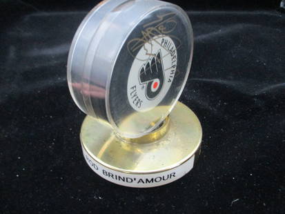 Rod Brind'Amour Signed Philadelphia Flyers Hockey Puck: In the storied history of the Philadelphia Flyers, few players embody the team's spirit and determination quite like Rod Brind'Amour. Renowned for his leadership, work ethic, and unwavering