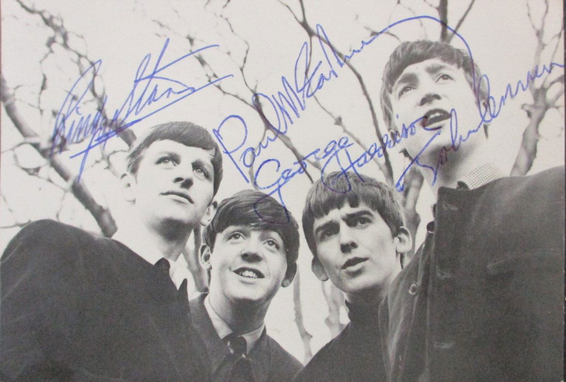 Beatles Signed Photo Measuring 4 x 6 Signed by all four Beatles, John, Paul, George, Ringo: This stunning 4 x 6-inch photograph captures a moment frozen in time, signed by all four legendary members of The Beatles: John Lennon, Paul McCartney, George Harrison, and Ringo Starr. Each signature