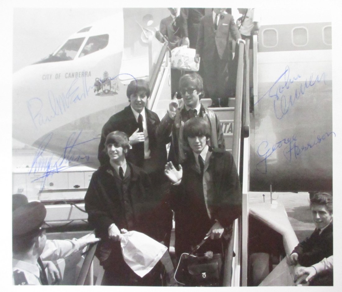Beatles Photo Walking Off of an Airplane Measuring 9 x 7 Signed (1 of 1)