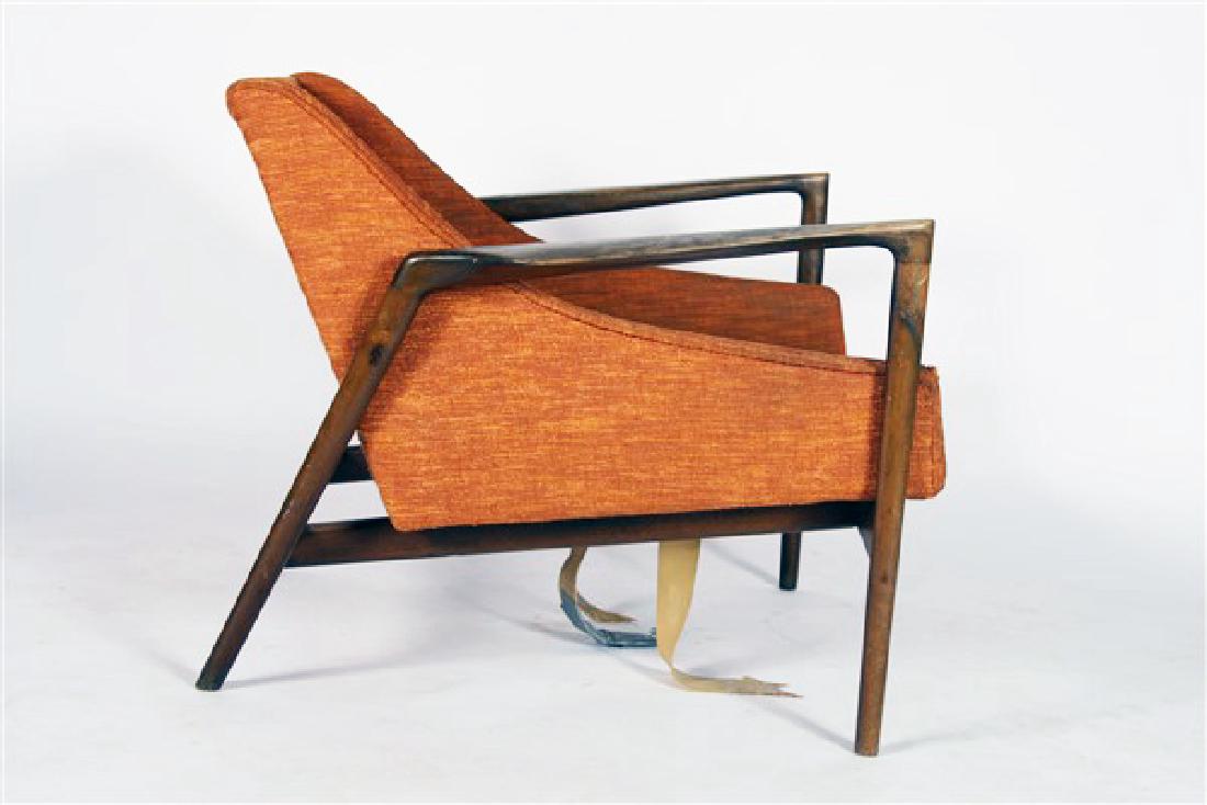 Style of Kofod-Larsen, Mid-Century Lounge Chair: Wood, upholstery. 20th C. Imported by Selig. Height: 24-1/2”, Length: 28-1/4”, Width: 31”. Mid-century modern lounge chair imported by Selig. Bears red and white sticker reading, “Made and Fin