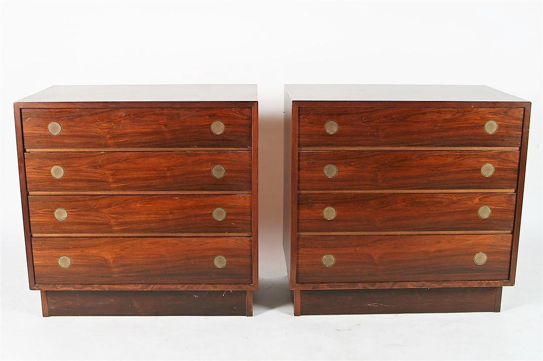 Pair of Dyrlund-Smith Modern Rosewood Dressers: Dyrlund (Danish, est. 1960). Wood, veneer, brass. c. 1960's-70's. Distributed by Smith Contemporary Furniture. Height: 29 1/8â€, Length: 29 1/2â€, Width: 17 3/4â€ ea. Dressers feature rosewoo
