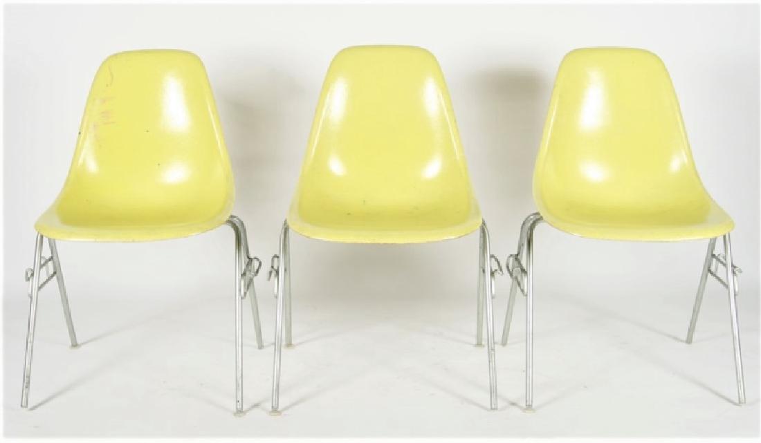 Three Yellow Herman Miller DSS Stacking Chairs (1 of 3)