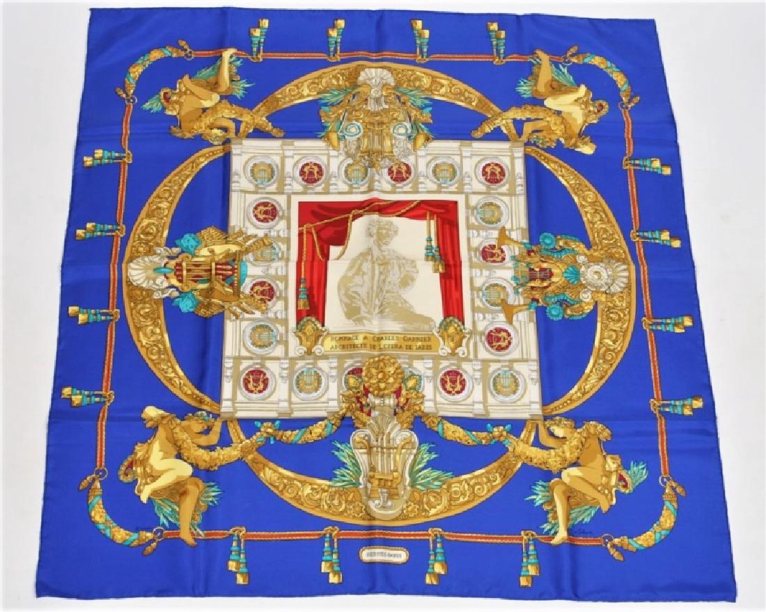 Hermes, "Homage a Charles Garnier" Silk Scarf: Designed by Caty Latham. "Homage a Charles Garnier". Silk. Designed 1986. Produced by Hermes. 35" x 35". "Homage a Charles Garnier" silk scarf in the royal blue colorway designed by Caty Latham for He