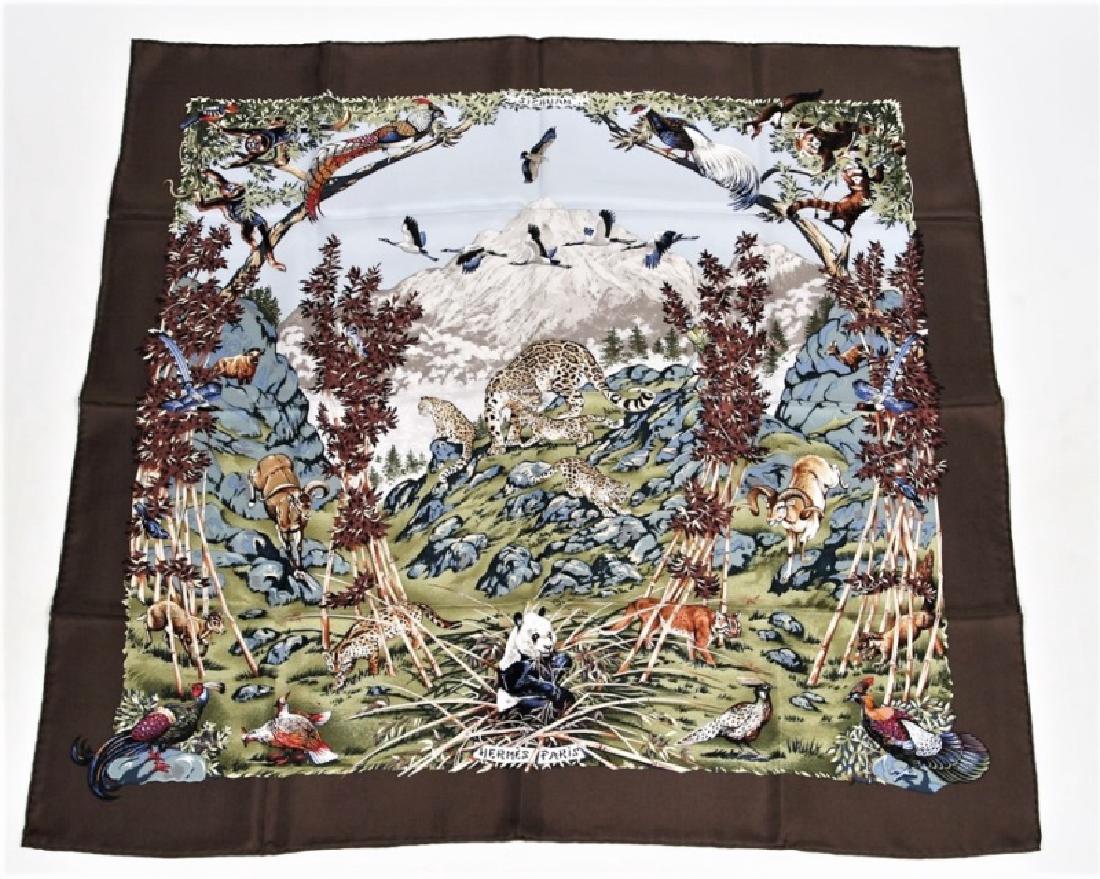 Hermes, "Sichuan" Silk Scarf in Brown: Designed by Robert Dallet. "Sichuan". Silk. Designed 1995. Produced by Hermes. 35" x 35". "Sichuan" silk scarf in the brown colorway designed by Robert Dallet for Hermes. Animal motif. Marked "Hermes"