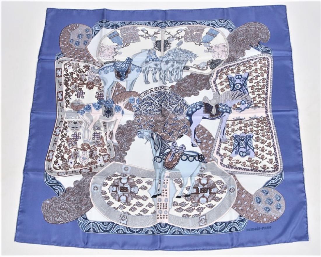 Hermes, "Art des Steppes" Silk Scarf in Periwinkle: Designed by Annie Faivre. "Art des Steppes". Silk. Designed 1991. Produced by Hermes. 35" x 35". "Art des Steppes" silk scarf in the periwinkle colorway designed by Annie Faivre for Hermes. Horse moti