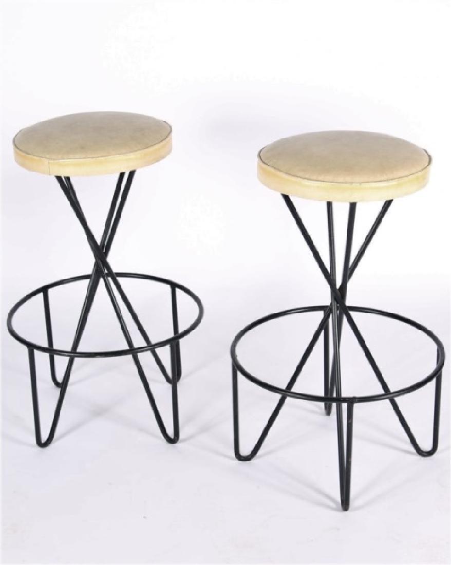 Attributed to Frederick Weinberg, Pair of Stools: Frederick Weinberg (American, 20th C.). Wrought iron, leather upholstery. Manufactured by The Ross Company (America). Height: 28", Base Diameter: 18 1/4" ea. Both stools feature a welded iron frame wi