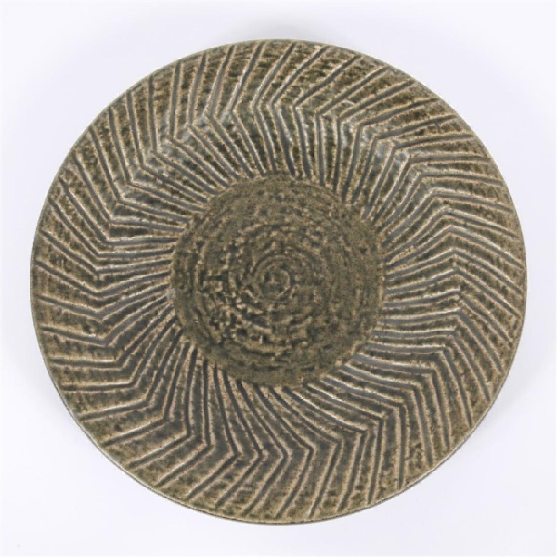 Mari Simmulson for Upsala-Ekeby, Ceramic Plate: Mari Simmulson (Swedish, 1911-2000). Ceramic. c. 1965. Distributed by Upsala-Ekeby (Swedish, 1886-1980). Height: 1 1/2", Diameter: 11 1/2". Ceramic plate features a zig-zag pattern with solid back. Un