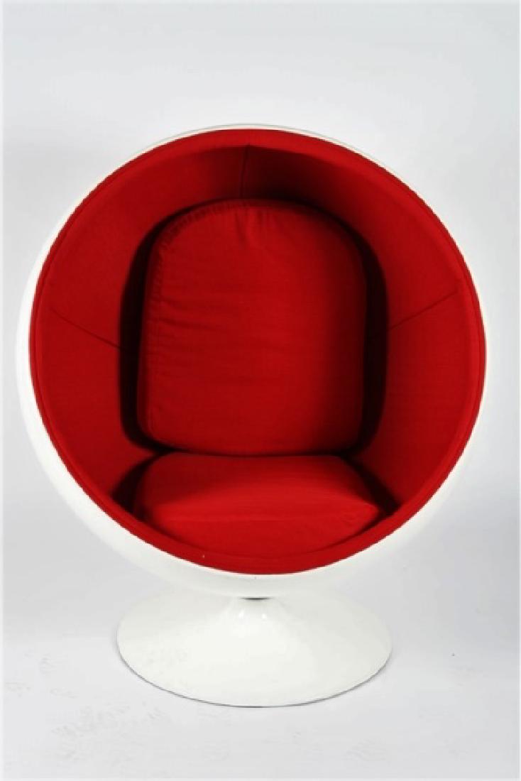 Reproduction Eero Aarnio for Asko, "Ball Chair": Fiberglass, upholstery. Height: 47", Length: 43", Depth: 38" (approx.), Seat Height: 14 1/2". White fiberglass chair features a 360 degree swivel base, and red upholstery in five sections to interior