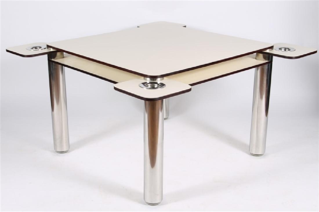 Joe Colombo for Zanotta, "Poker" Card Table: Joe Colombo (Italian, 1930-1971). "Poker". Laminate, stainless steel. Design: 1968. Manufactured by Zanotta (Italy, est. 1954). Model: 2625. Length: 38 1/2", Depth: 38 1/2", Height: 27 3/4". Table fea